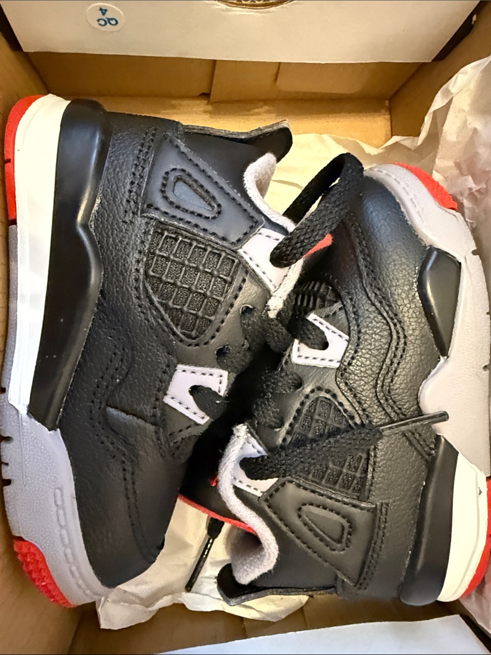 Jordan Kids Black, White and Red Retro Sneakers